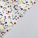 TESSUTO RASO CARNEVALE POIS MULTICOLOR BIANCO