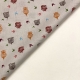 TESSUTO COTONE FANTASIA GABBIETTE E RONDINELLE PANNA